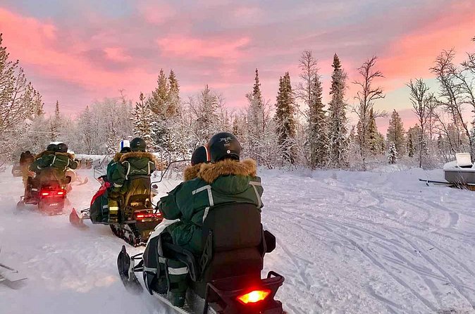 Afternoon Snowmobile Tour - Across frozen lakes and through forest tracks