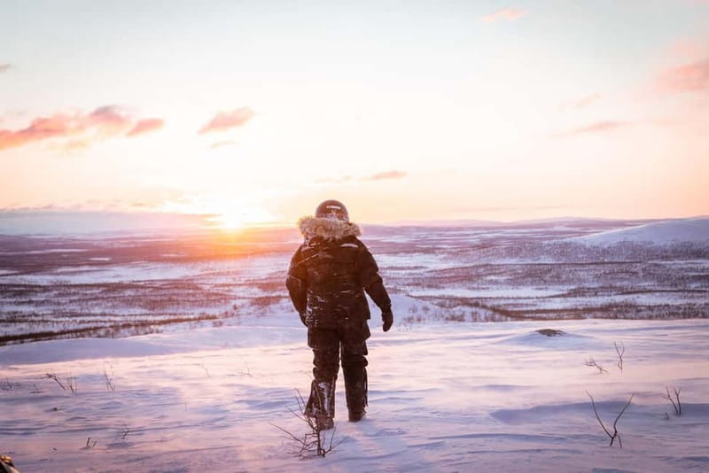 Arctic Dream - Snowmobile Safari to Lapland Viewpoint - Ice fishing on a frozen lake