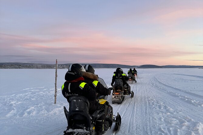 Day tour with snowmobile in Kiruna 10:30 am - Swedish fika beside the trail