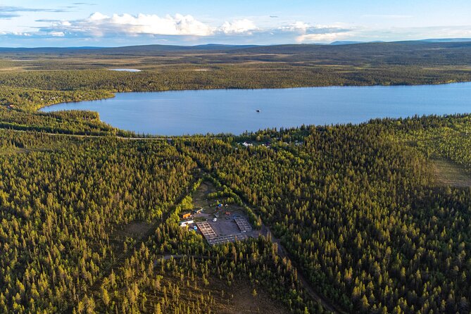 Meet 70 Huskies and Enjoy a short ATV Tour with the Huskies - Coffee, Tea, and a Fire in the Forest