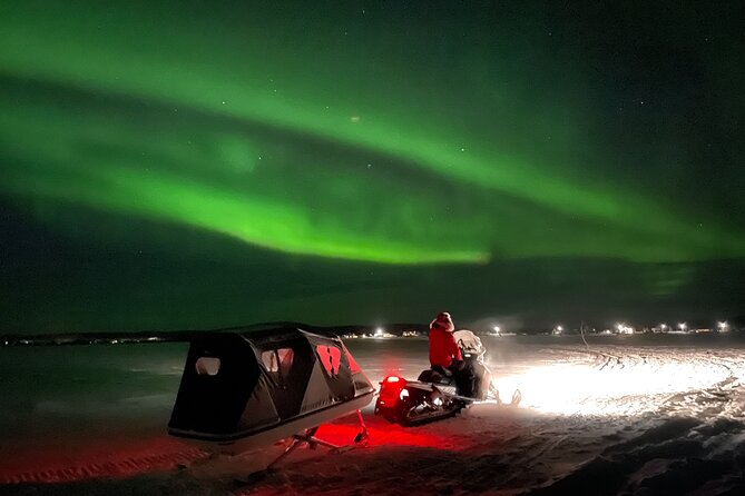 Northern Light snowmobile tour in Kiruna 7:30 pm - Learning to handle a modern snowmobile