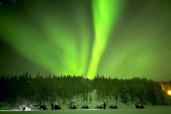 Northern Light snowmobile tour in Kiruna 7:30 pm - Through the forest, across the lake, and away from town lights