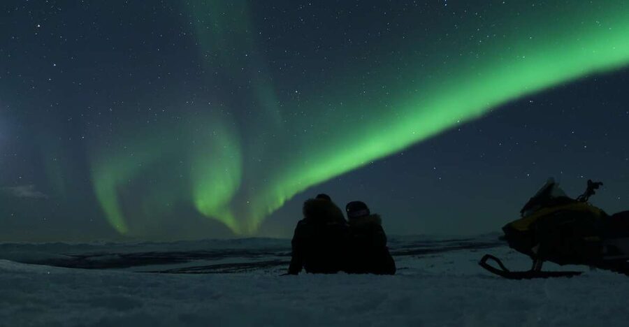 Premium Aurora Snowmobile Ride With Panoramic Views - Arctic clothing that makes the night easier