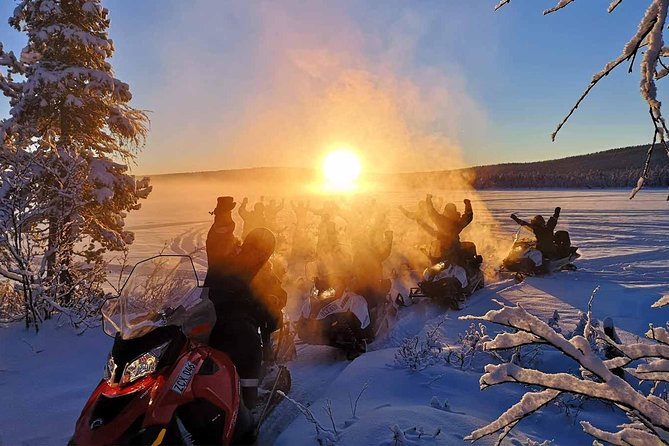 Snowmobile Arctic Adventure - Riding through forest, lake, and river country
