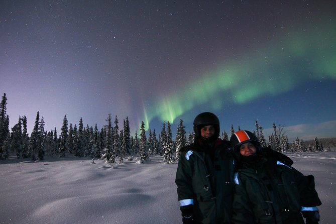 Snowmobile Aurora Expedition with dinner - Searching the sky with a local guide
