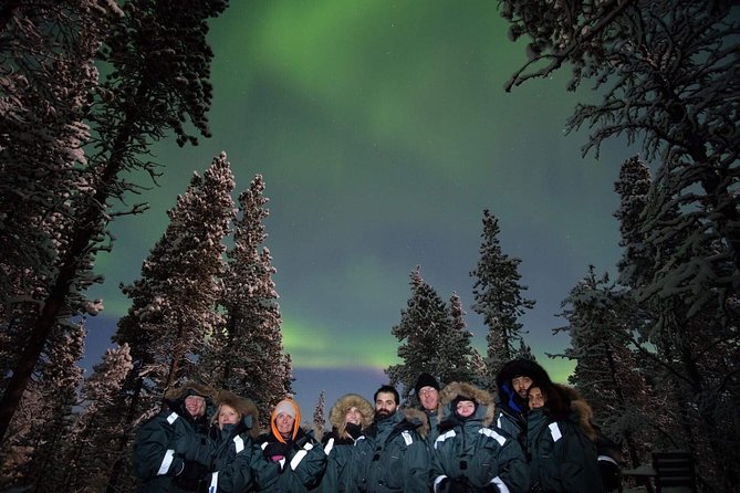 Snowmobile Aurora Expedition with dinner - Clothing, glasses, and cold-weather comfort