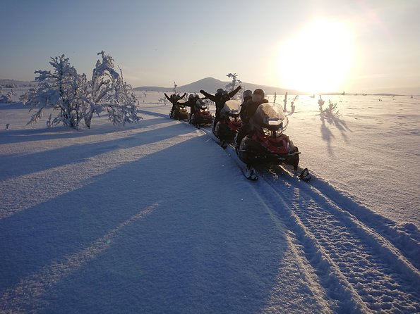 Snowmobile Safari to Lapland viewpoint - Coffee, Swedish fika, and a frozen lake