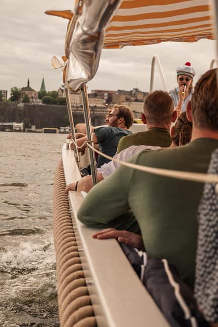 Stockholm: Guided City Sightseeing Open Electric Boat Tour - Open-air comfort, weather, and practical details
