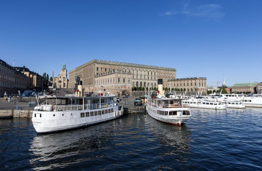Stockholm: Old Town Walking Tour w/ Vasa Museum & Boat Ride - Walking through Gamla Stan’s narrow lanes