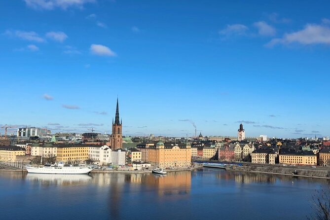 Stockholm Small Group Food Tour with 7 Classic Food Tastings - Crossing toward Norrmalm on Drottninggatan